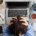 Image of a stressed woman with her hands in her hair sitting over her laptop. Do you struggle with workplace anxiety? Learn how anxiety therapy in Atlanta, GA and anxiety therapist can help you cope with the anxiety symptoms.