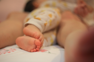 A close up of a baby's feet, representing the bonds cultivated after working with a postpartum therapist in Atlanta, GA. Search for an online anxiety therapist in Atlanta, GA or search for "postpartum therapist atlanta" to learn more. 
