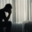 A silhouette of a man holding their head while in a dark room. This could represent the pain of depression that a depression therapist in Atlanta, GA can address. Learn more about depression therapy in Atlanta, GA and how online depression therapy in Atlanta, GA can offer remote support.
