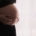 Image of a pregnant mother holding her belly. If you are pregnant and looking for support, discover how pregnancy counseling in Atlanta, GA can help you navigate your pregnancy journey.