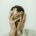 Stressed man covering his face with crumpled paper, capturing overwhelm and racing thoughts. Support is available through anxiety therapy in Atlanta, GA, meeting with an anxiety therapist in Atlanta, GA, or starting therapy for anxiety in Atlanta, GA.